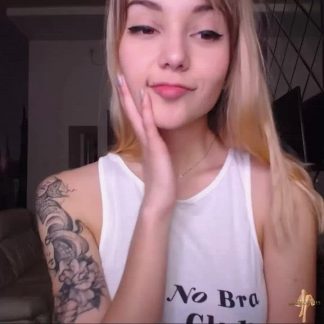 Smiling Girl With Tattoo On Shoulder
